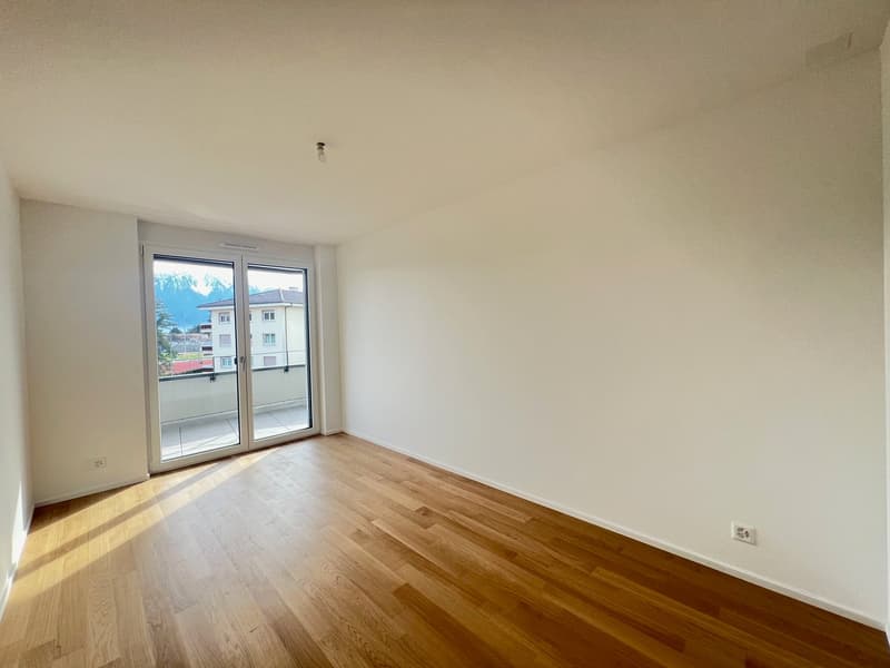 Bello appartamento di 3.5 locali con balcone-terrazza in una residenza Minergie recente (7)
