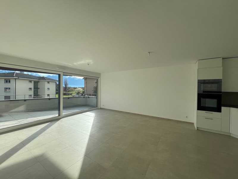 Bello appartamento di 3.5 locali con balcone-terrazza in una residenza Minergie recente (2)