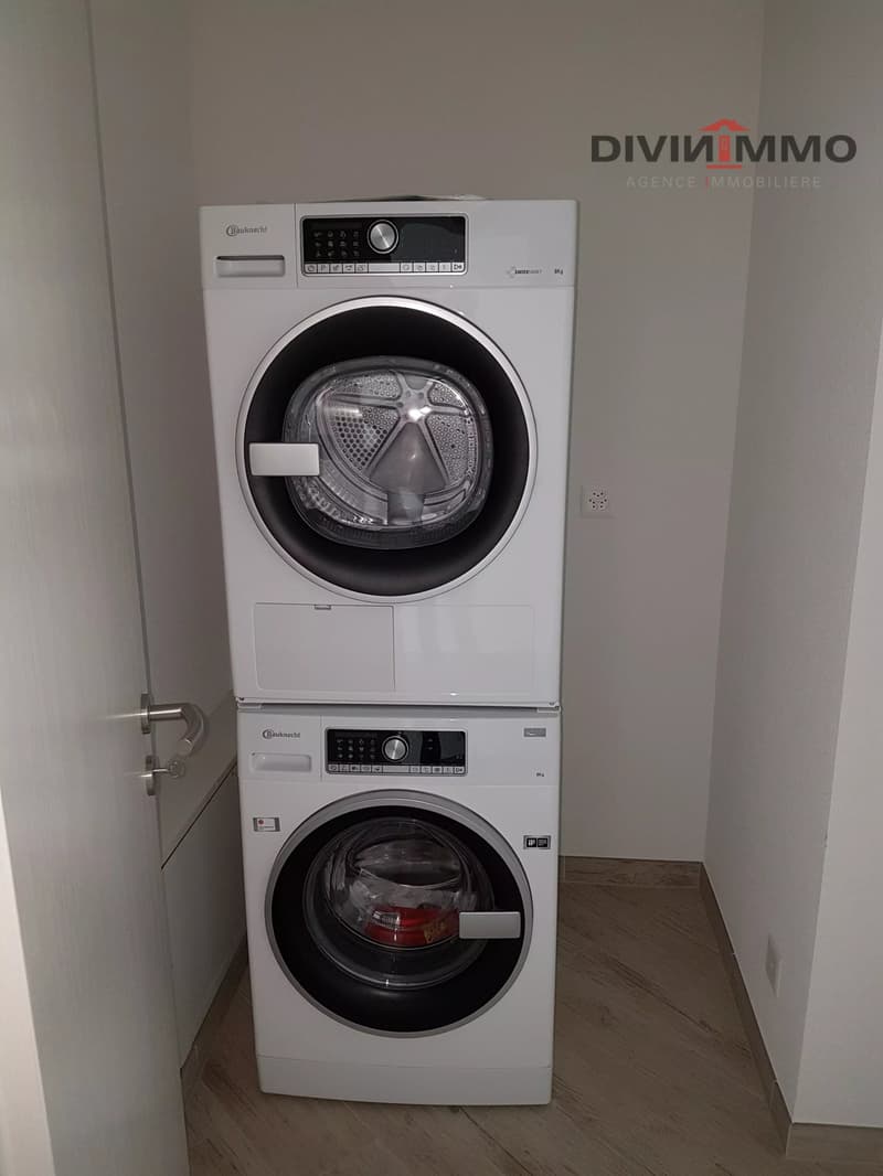Bello appartamento di alto standing nel cuore del villaggio con due garage (13)