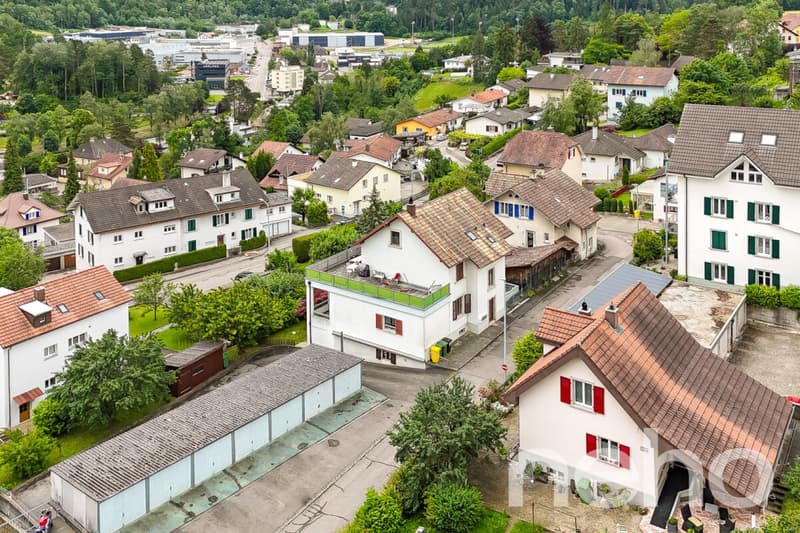 Immeuble de rendement | 13 garages | et Terrain constructible ! (12)