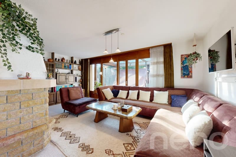 Charmante maison offrant un bel espace extérieur et une véranda (8)