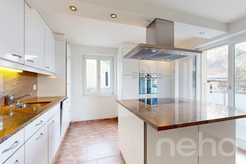 Spacious renovated duplex of 160 m² in the heart of the village of Riddes (1)