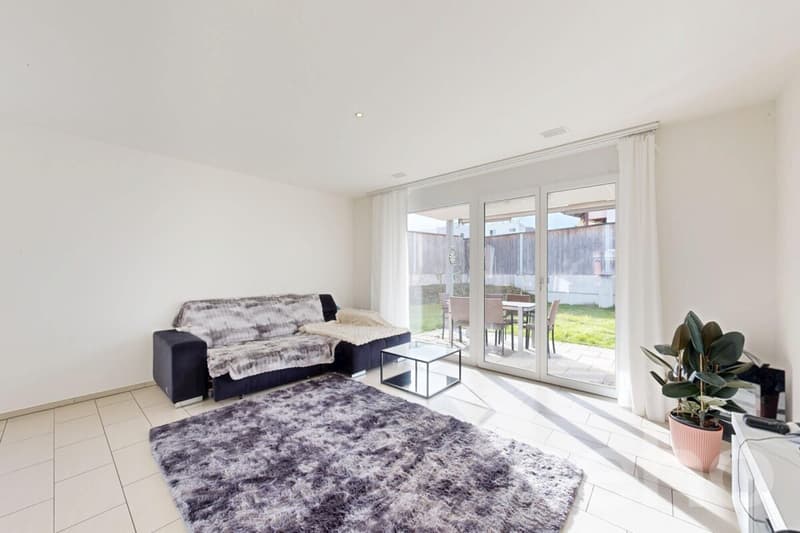 Appartamento giardino moderno 3,5 locali con giardino di 184 m² e area di soggiorno (3)