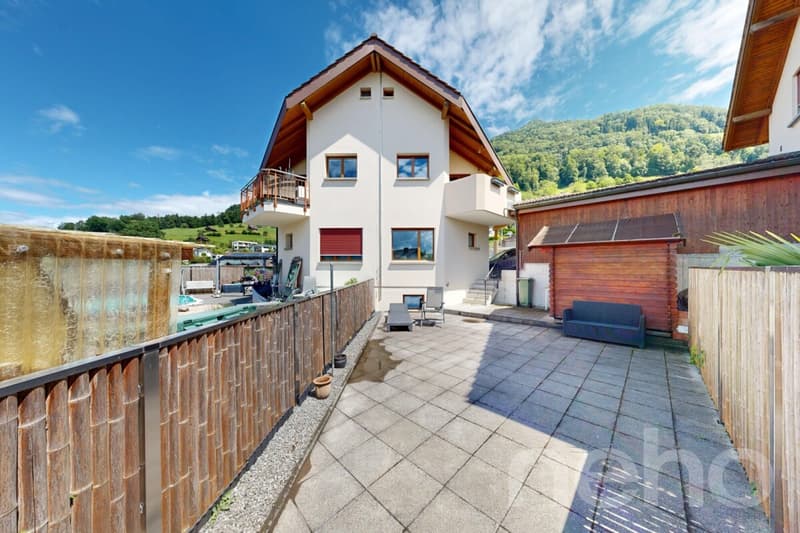 Double-family house with double carport and photovoltaic system (3)