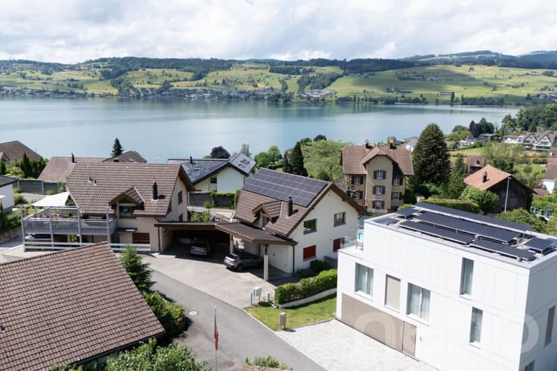 Double-family house with double carport and photovoltaic system (1)