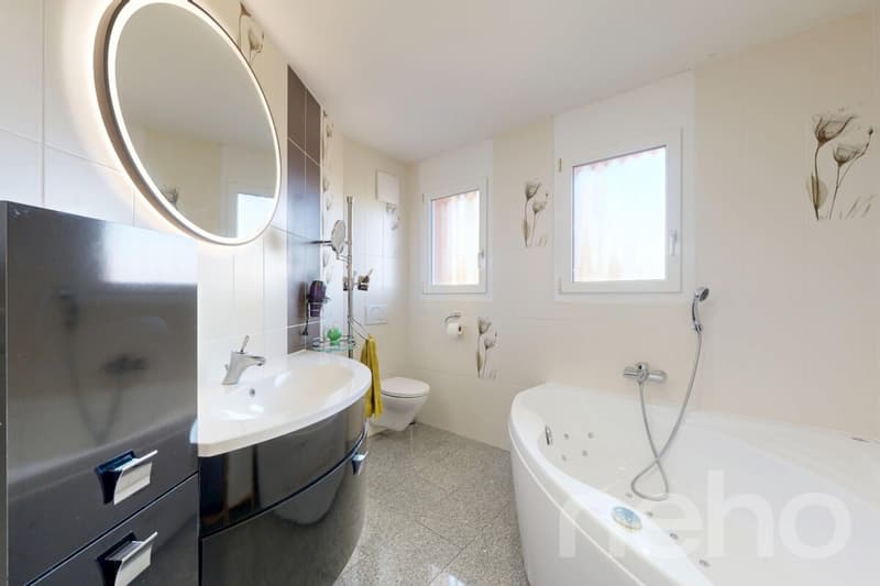 Spacieux appartement familial avec balcons et jardin à St-Prex (12)