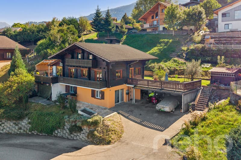 Chalet 8.5 + studio et vue dégagé dans un quartier calme bien situé (1)