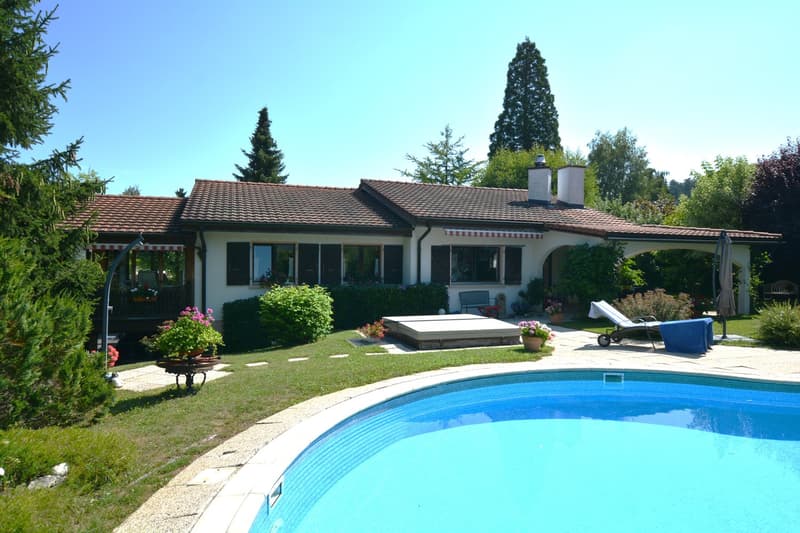 2 story house, tiled roof, pool, deck, lawn, patio furniture, garden, trees, bushes, plants