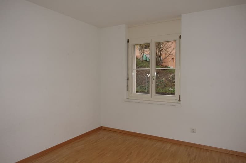 empty room, white walls, hardwood floors, window with view outside