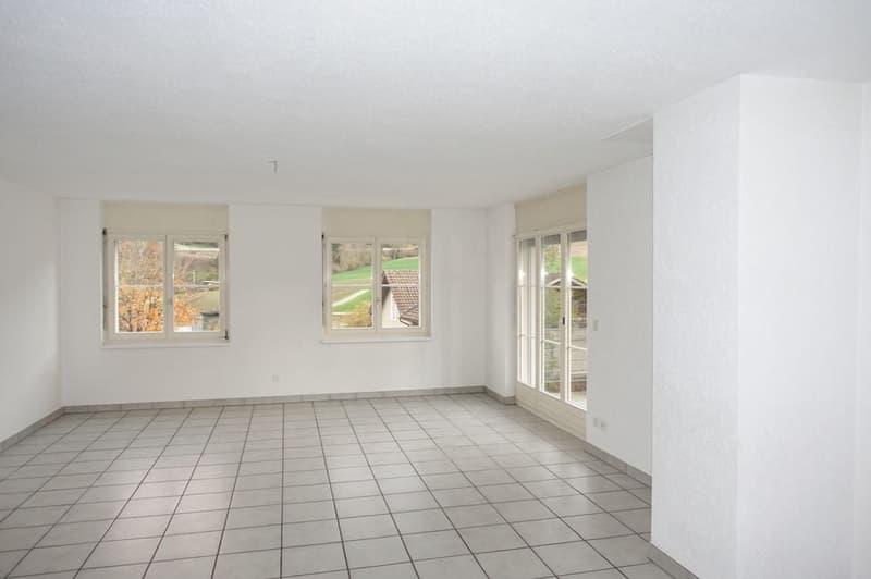 Empty room, white tiles, glass windows, sliding door