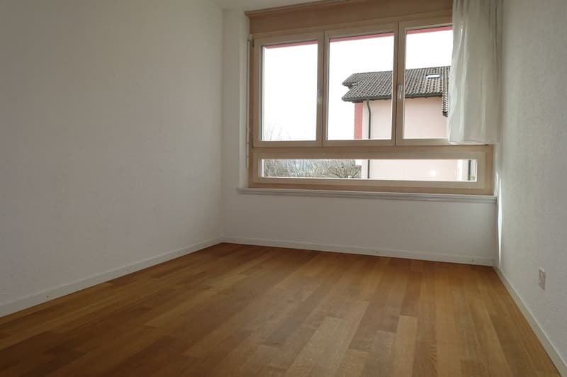 empty room, wooden floor, white walls, large window with view