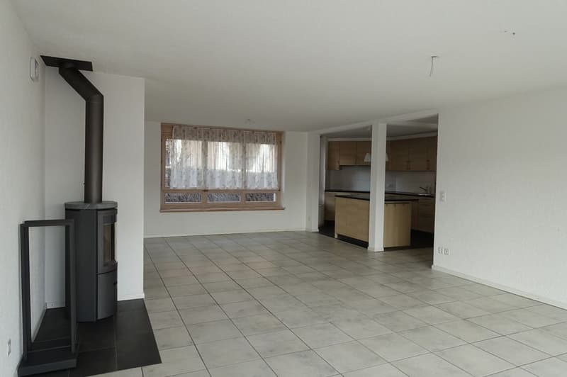 empty room, fireplace, tiled floor, white walls, window with curtains, kitchen area