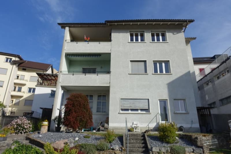 Tramelan - Maison de 2 appartements et atelier, annexe et places de parc, au centre de la localité (1)