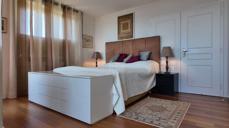 Appartamento con terrazza di 96m2, balconi e vista sul lago (9)