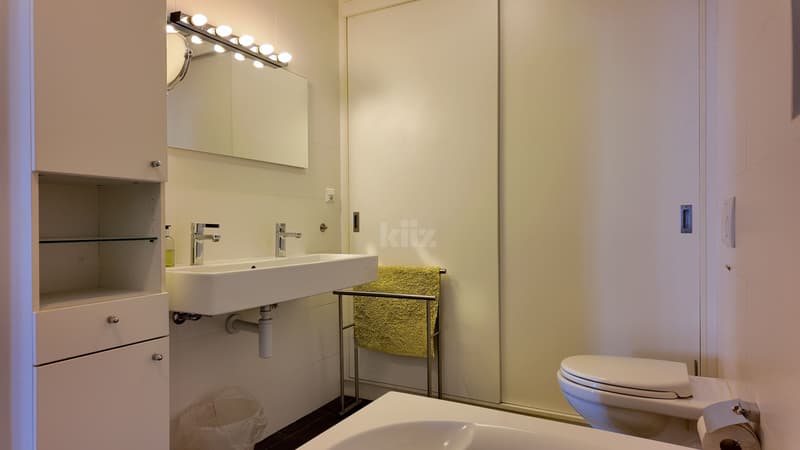 Appartamento con terrazza di 96m2, balconi e vista sul lago (10)