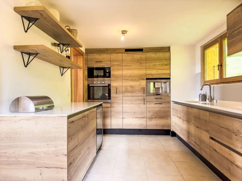 Una casa da sci ben progettata con accesso diretto alle piste. (5)