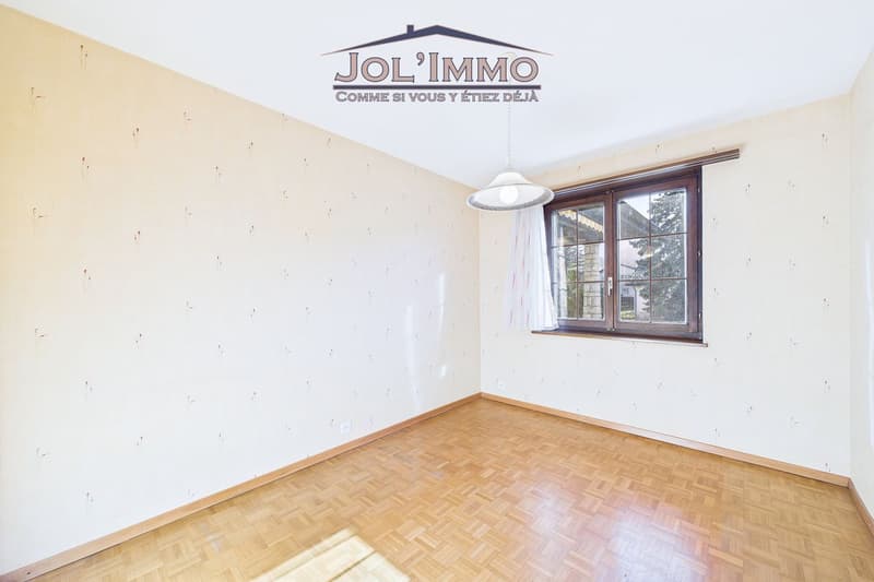 Maison familiale 6.5 pièces avec volumes généreux et grand jardin à Courrendlin (9)