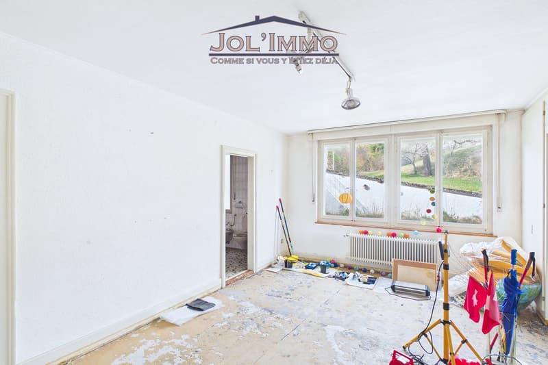### Eigentumswohnung mit 3 Apartments und Baugrund in Perrefitte (12)