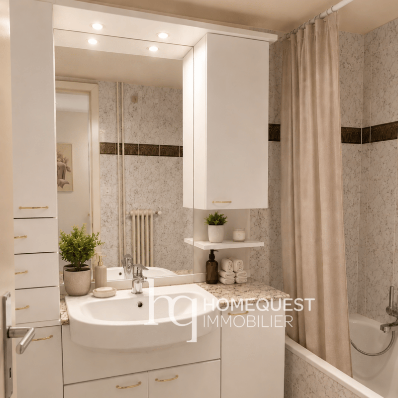 Appartement lumineux de 72 m² avec balcon plein sud, garage-box et potentiel de transformation en 3 pièces, dans un environnement résidentiel recherché à Pully. (4)