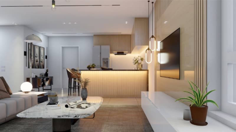 modern living room with gray couch, marble coffee table, and white entertainment unit. Center piece plant, flat screen TV mounted on wall, and modern lighting. White and light grey color scheme.