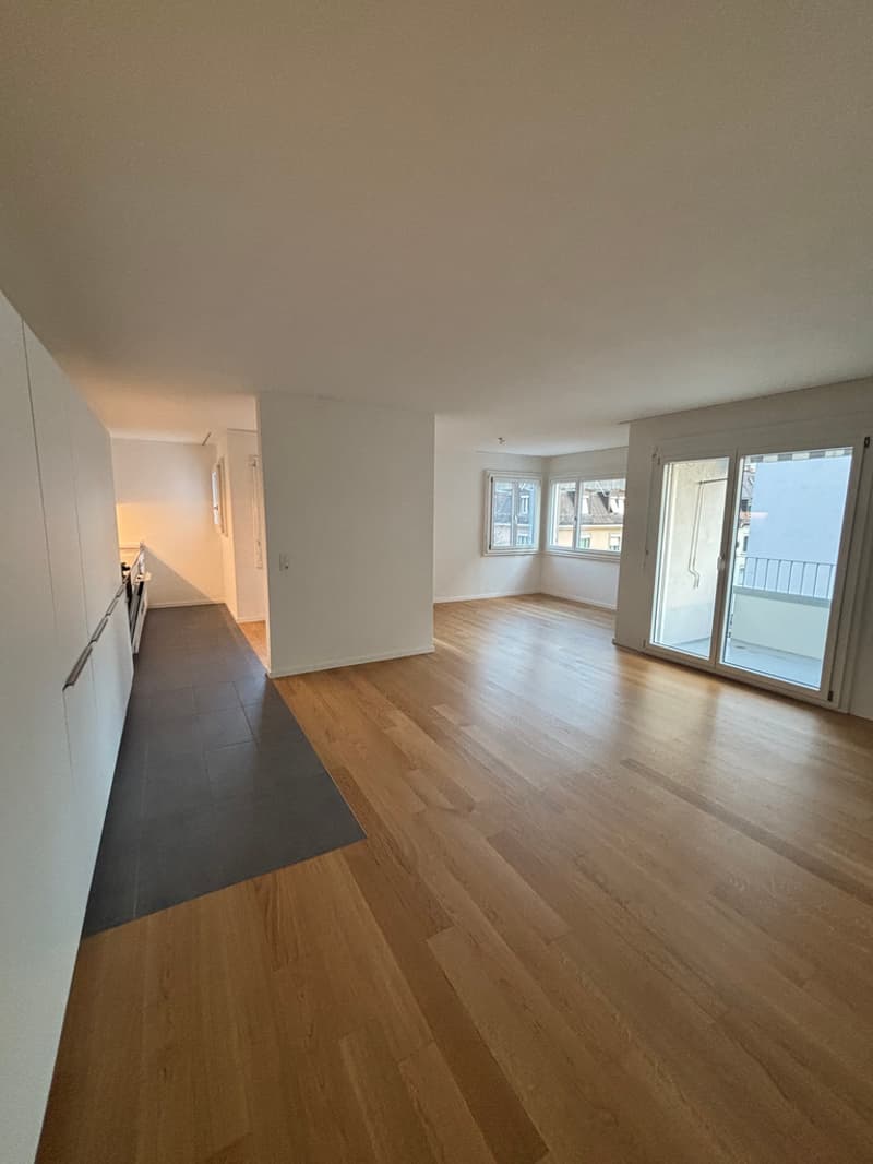Wohnzimmer_mit_Kueche.jpg
