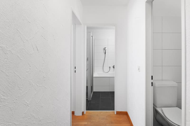 bathroom, tile flooring, shower, bathtub, toilet