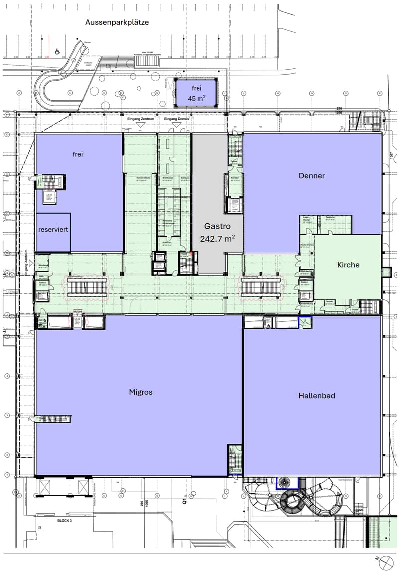 The image shows a floor plan with various rooms and spaces. It includes a Gastro area of 242.7 m2, a Denner area, a Kirche (church) area, a Migros area, a Hallenbad (indoor pool) area, and some reserved and free spaces. There is also a 45 m2 free space an
