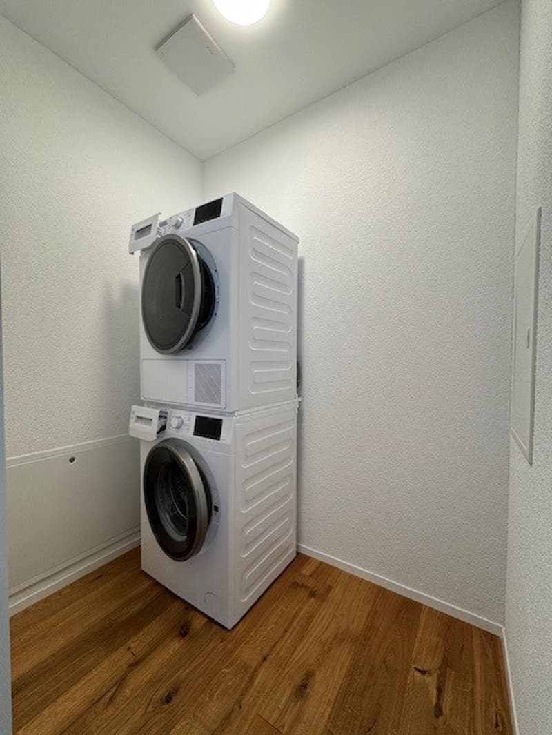 laundry area with washing machine and dryer