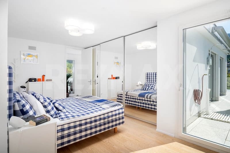 Exclusive 3.5-room attic apartment with large terrace and breathtaking mountain views (12)