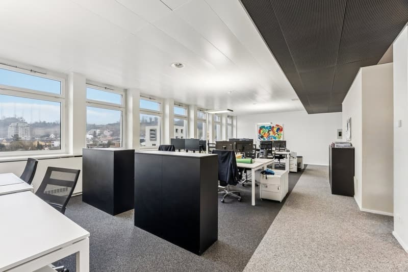 modern office room, white walls, gray floor, large windows, office furniture, computer stations
