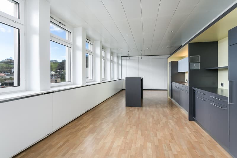empty room, modern interior, wooden floor, large windows, kitchen area, cabinets