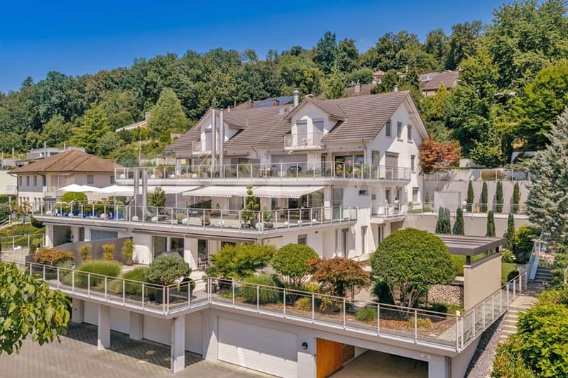 Terrassen-HAUS inkl. Doppelgarage und AAA-Gartenanlage (1)