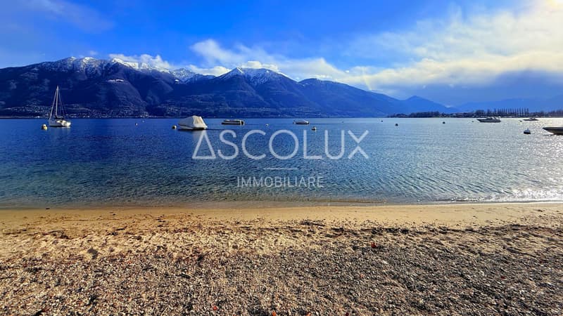 Elegance, Design, and Luxury: Spacious 4.5-Room Apartment with Terrace and Magnificent Lake View (19)