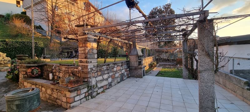garden with stone pavement, stone walls, pergola, open spaces, trees, elevated position, views