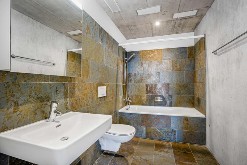 Appartement lumineux 2.5 pièces avec cuisine moderne et espace de séjour privé (5)