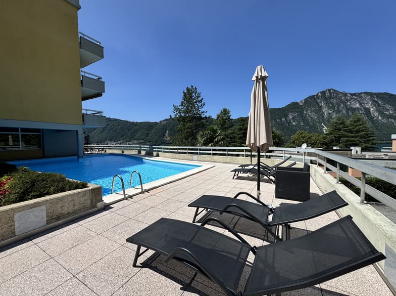 Zu vermieten 2.5-Zimmer-Wohnung mit Garten, Pool und Seeblick in Bissone (1)