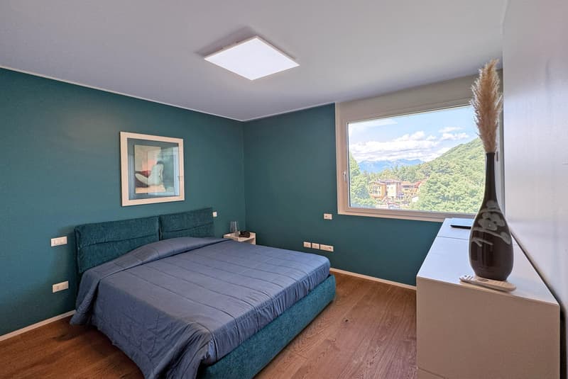 SPLENDIDO E AMPIO 4.5 LOCALI VISTA LAGO NEL VERDE A CARONA (7)