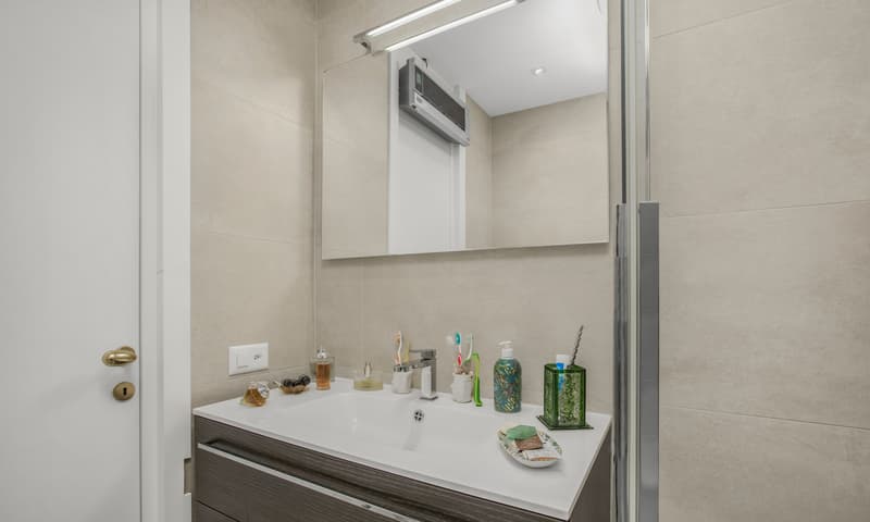 ELEGANTE 2.5 LOCALI IN POSIZIONE COMODA A LUGANO CASSARATE (8)