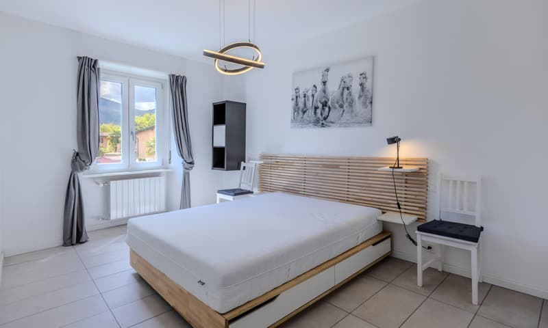 OCCASIONE - AMPIO 3.5 LOCALI CON BALCONE A LUGANO FIGINO (8)