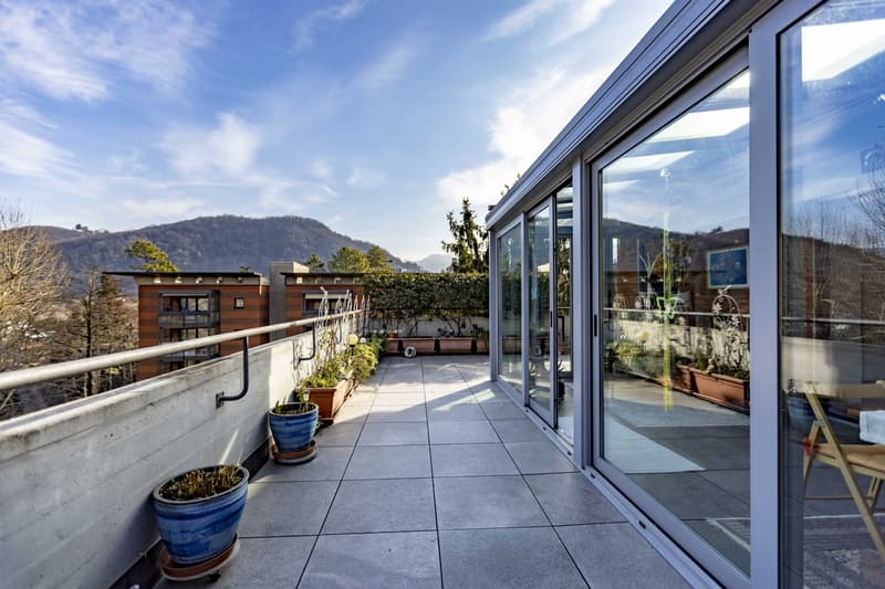 SPAZIOSO ATTICO 3.5 LOCALI CON SPLENDIDA TERRAZZA AD AGNO (1)