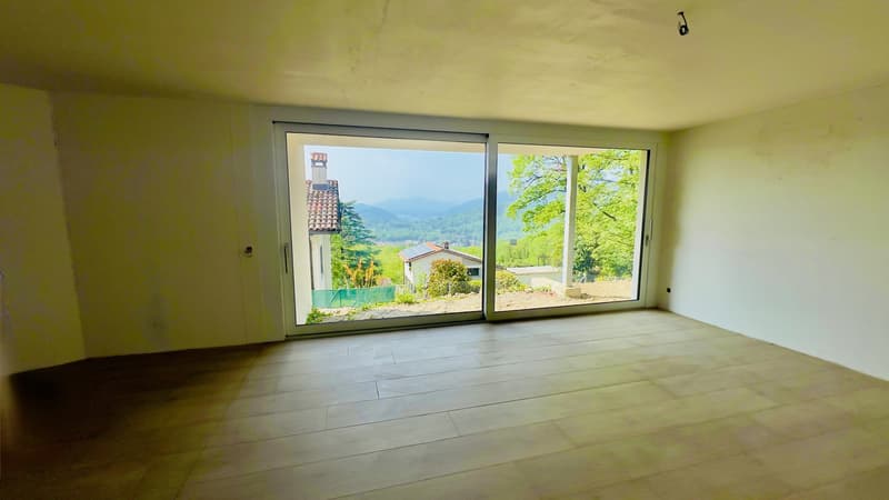 ESCLUSIVO E SPAZIOSO 4.5 LOCALI CON GIARDINO IN CAPRIASCA (2)