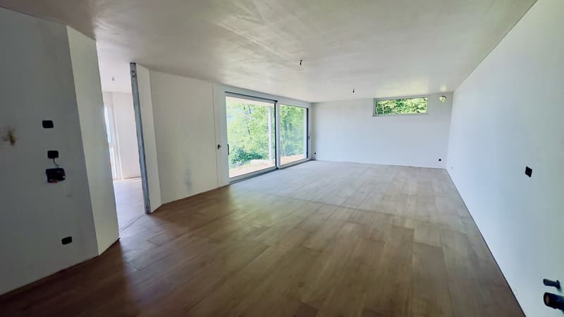 ESCLUSIVO E SPAZIOSO 4.5 LOCALI CON GIARDINO IN CAPRIASCA (3)