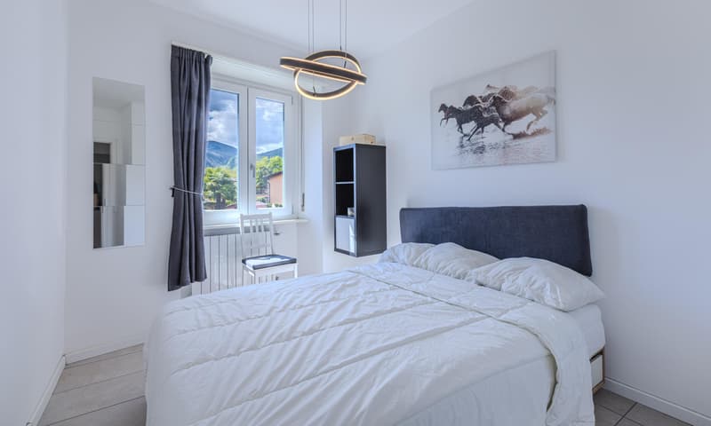 OCCASIONE - AMPIO 3.5 LOCALI CON BALCONE A LUGANO FIGINO (6)