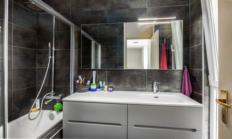 CASA A SCHIERA DI 4.5 LOCALI CON GIARDINO A PONTE CAPRIASCA (8)