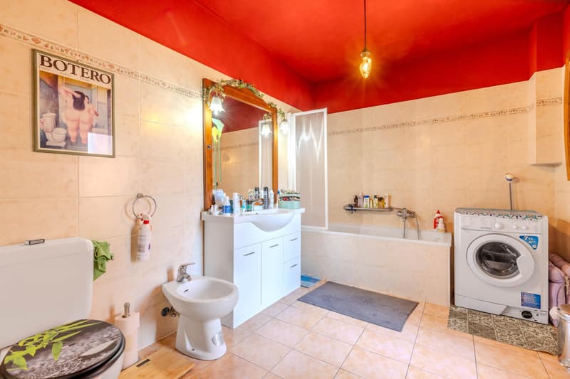 AMPIA E LUMINOSA CASA DI 13 LOCALI NEL VERDE A NOVAZZANO (8)