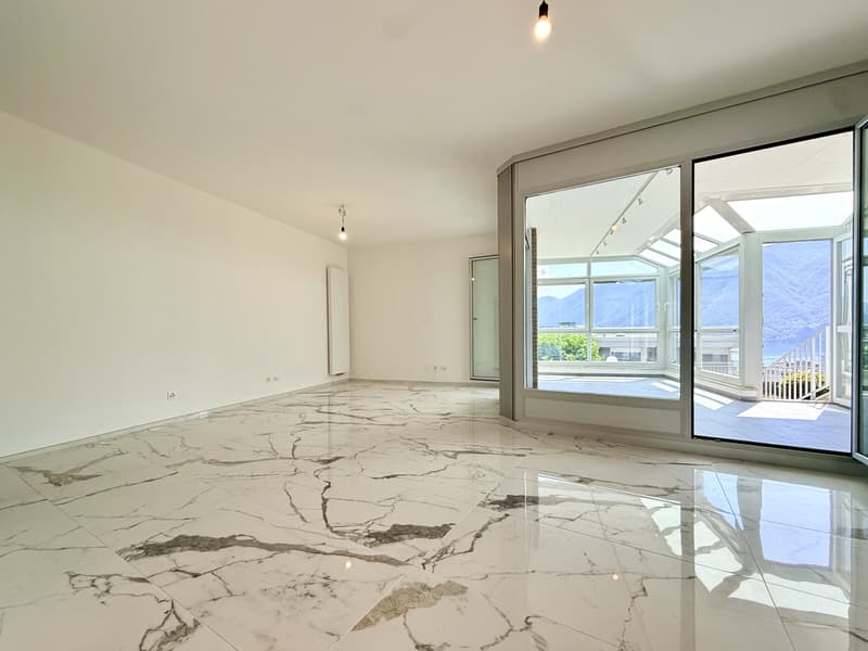 ELEGANTE 4.5 LOCALI CON VERANDA E SCORCIO SUL LAGO A LORETO (1)