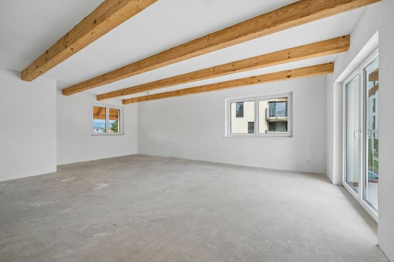 Wohn- und Esszimmer mit Zugang zur Terrasse