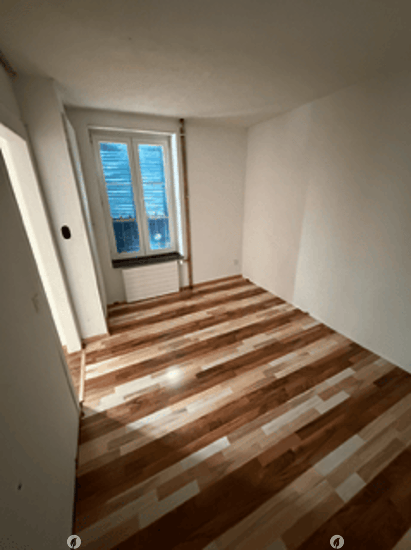 empty room, hardwood floors, white walls, window with white frames, wooden window sill