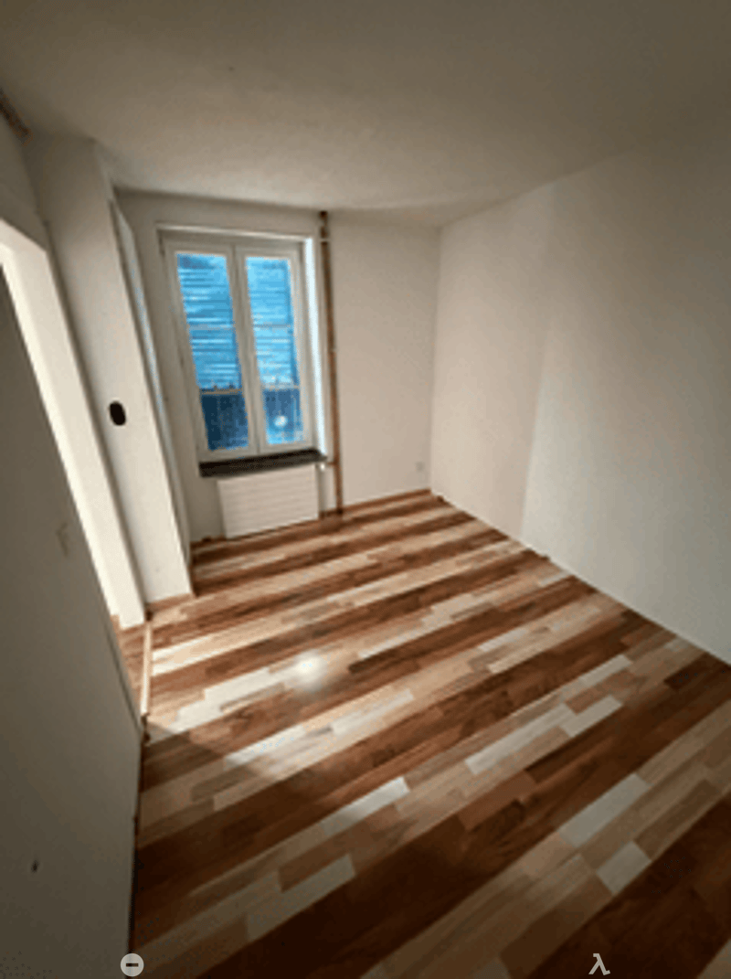 empty room, hardwood floors, white walls, window with white frames, wooden window sill