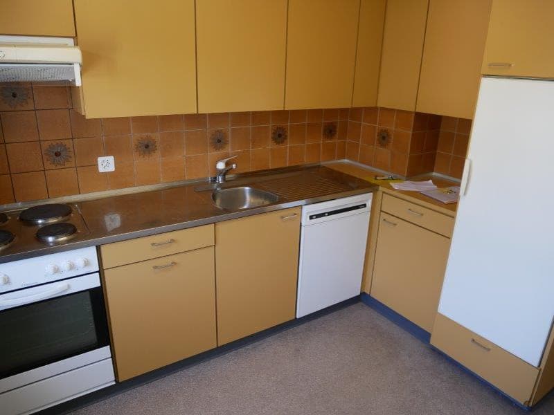 kitchen with yellow cabinets, stainless steel countertop, sink, dishwasher, refrigerator, stove